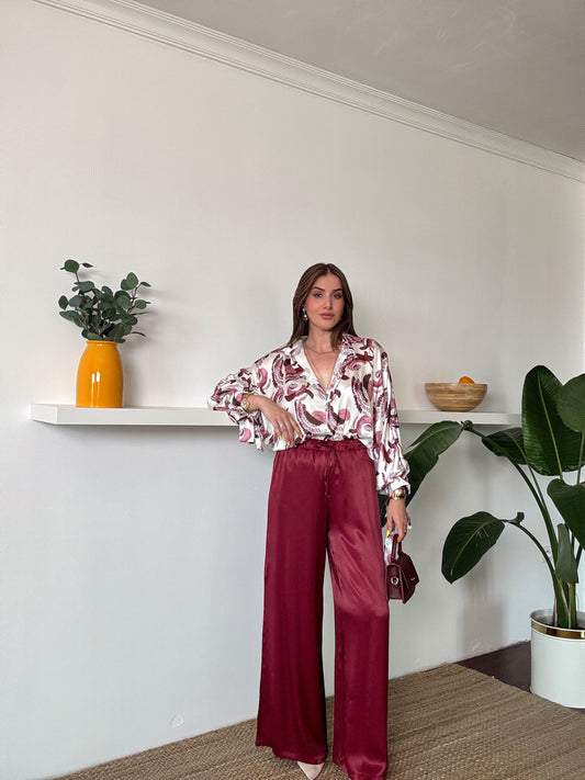 Beli lastikli saten bol paça pantolon BORDO
